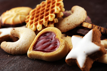 Mixed Christmas cookies. Colorful mix of Christmas-themed decorated cookies