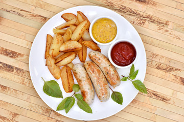 Bavarian sausages. German cuisine. A dish of chicken meat.