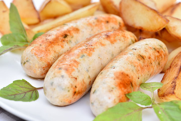 Bavarian sausages. German cuisine. A dish of chicken meat.