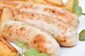 Bavarian sausages. German cuisine. A dish of chicken meat.