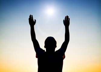 Person praying outdoor