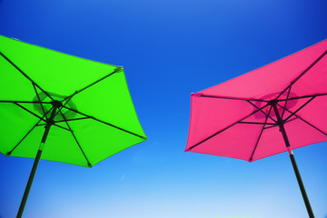 Detail of beach parasol at blue sky

