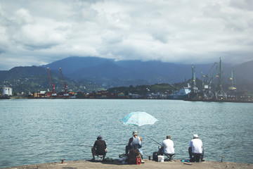 Fishermen from morning till night catch fish