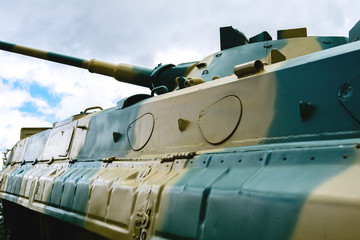 the tower of the combat vehicle of the landing is painted in camouflage color
