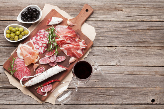 Salami, ham, sausage, prosciutto and wine