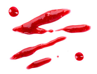 Raspberry jam drizzle isolated on white background. Top view