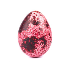 Quail easter egg pink color, isolated on white background. Easter concept. Macro