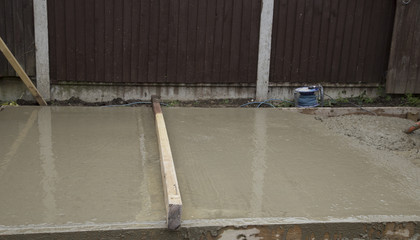 leveling wet cement
