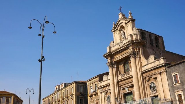 View on historic architecture of the downtown on a sunny day in Catania, Italy.
