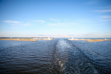 Industrial buildings and smokestacks in St Petersburg from the water