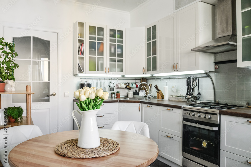 Wall mural Bouquet of tulips in interior of the kitchen