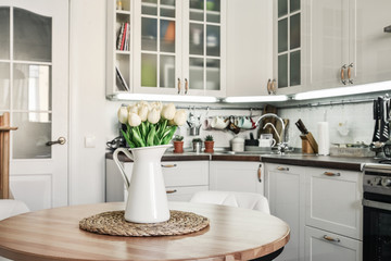 Bouquet of tulips in interior of the kitchen