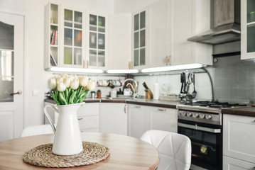 Bouquet of tulips in interior of the kitchen