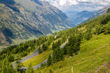 Fototapeta na wymiar Alpine valley, high mountain roads