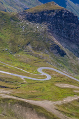 Fototapeta premium Alpine valley, high mountain roads