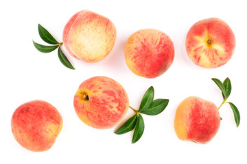 ripe peaches with leaves isolated on white background. Top view. Flat lay pattern