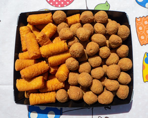Fresh fried of potato croquettes and olives