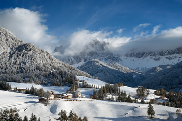 Mountain village in the snow in winter