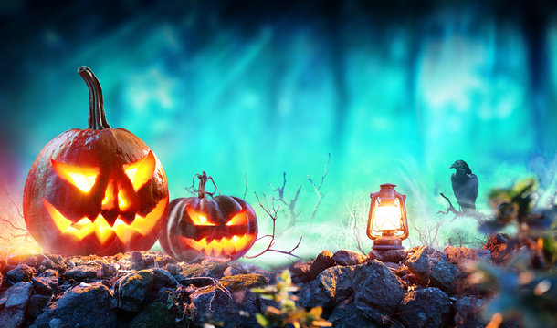 Halloween Pumpkins In Spooky Forest With Lantern And Crow
