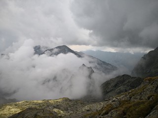 Fototapeta na wymiar Stormy weather in the mountains - panoramic landscape