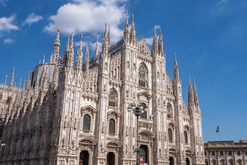 Fototapeta premium Milan, Italy - June 2018 : Famous Milan Cathedral (Duomo di Milano), view of the architecture detail