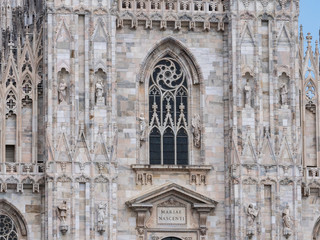 Fototapeta na wymiar Milan, Italy - June 2018 : Famous Milan Cathedral (Duomo di Milano), view of the architecture detail