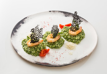 Rice with herbs and shrimps isolated on white background