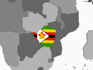Zimbabwe with flag on globe