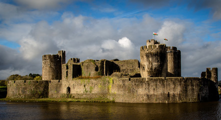 Fototapeta premium Caerphilly Castle (Welsh: Castell Caerffili) is a medieval fortification in Caerphilly in South Wales. The castle was constructed by Gilbert de Clare in the 13th century as part of his campaign to con