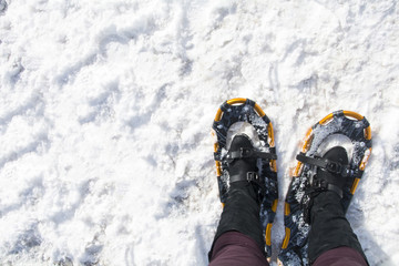 snow shoeing in the winter snow