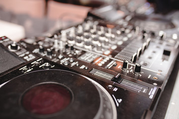 Close up shot vintage vinyl party dj audio equipment.Turntable High quality Sound mixing controller...
