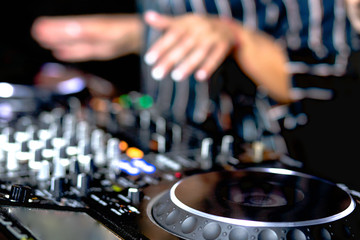 Young girl female shot party dj audio controlling mixing. Turntable High quality Sound mixing...
