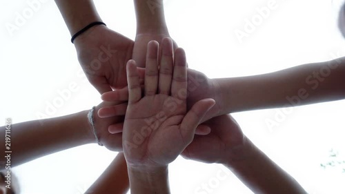 free video download successful team: many hands holding together