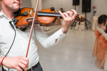 Violin playing viola musician. Man violinist classical musical instrument  fiddle playing on...