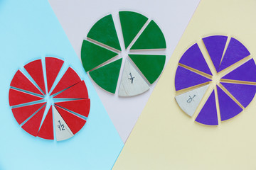 colorful math fractions on the bright backgrounds. interesting math for kids. Education, back to...
