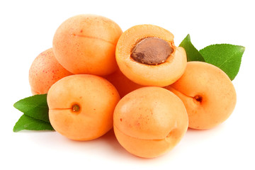 Apricot fruits with leaves isolated on white background macro