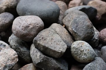 Fototapeta na wymiar Field stones stacked. Stone field - Central Europe.