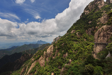 Fototapeta na wymiar Sanqingshan, Mount Sanqing National Park - Yushan, Jiangxi Province, China. National Geopark and Sacred Taoist Mountain, UNESCO World Heritage. China Cliff Walk, walkway suspended along mountain cliff