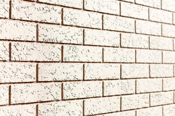 Rough wall texture, wall background, house facade with spatula technology. Close