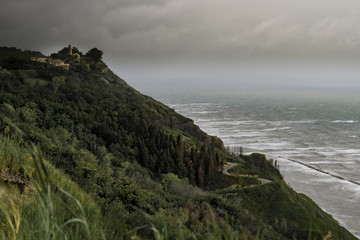 Fototapeta na wymiar Fiorenzuola di Focara veduta sul mare adriatico