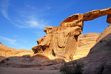 Fototapeta na wymiar Natural rock arch in Wadi Rum Jordan