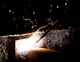 Flash and sparks from electric welding