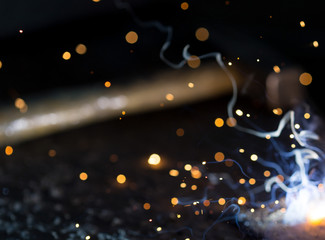 Flash and sparks from electric welding