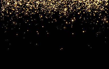 Drop gold champagne sparks, bright yellow particles Shine on black background, cheerful holiday, happiness, Christmas, new year