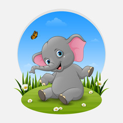 Cartoon baby elephant posing on the grass