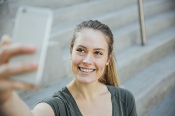 Blonde Woman in Her Twenties Taking A Selfie - University or College Student