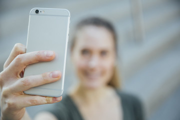 Blonde Woman in Her Twenties Taking A Selfie - University or College Student