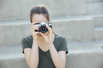 Photography Student Holding an Analog Vintage 35mm Camera