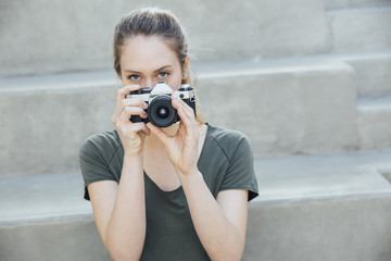 Photography Student Holding an Analog Vintage 35mm Camera