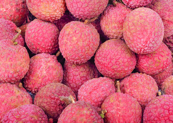 Fresh red lychee fruits background